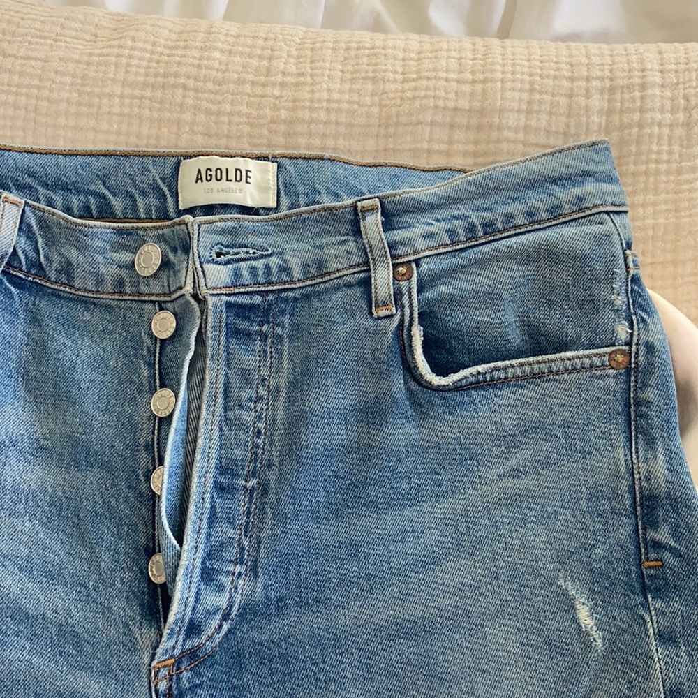 AGOLDE high waisted jeans with slit at the bottom.